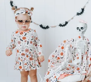 Dream Big Little Co x Madi Nelson Bow-Tastic Skellies Dream Onesie Dress