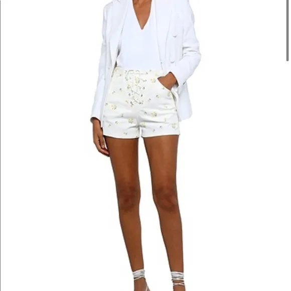 For Love &amp; Lemons White with yellow flowers Denim Embroidered Shorts L