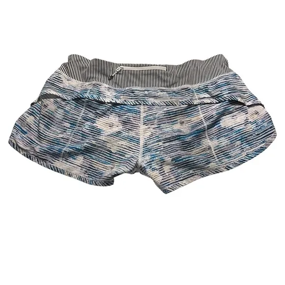LULULEMON 10 Speed Blurry Bell in Purple Navy Lilac Striped Shorts Size 10