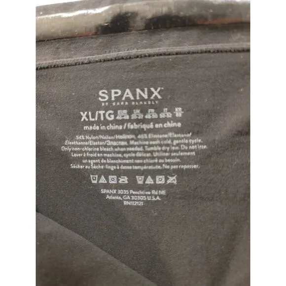 Spanx Oncore Mid Thigh Shorts in Black